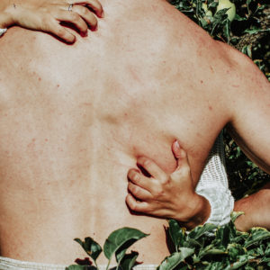 Man and Woman laying in nature