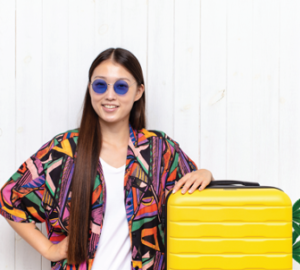 Image of woman with yellow suitcase