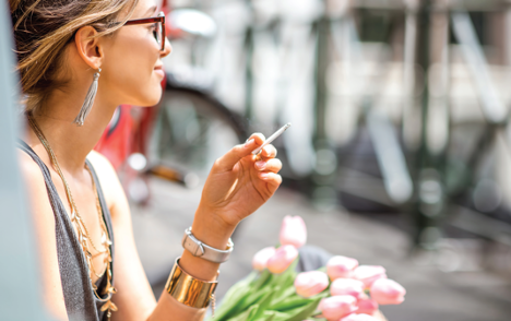 image of woman smoking a joint